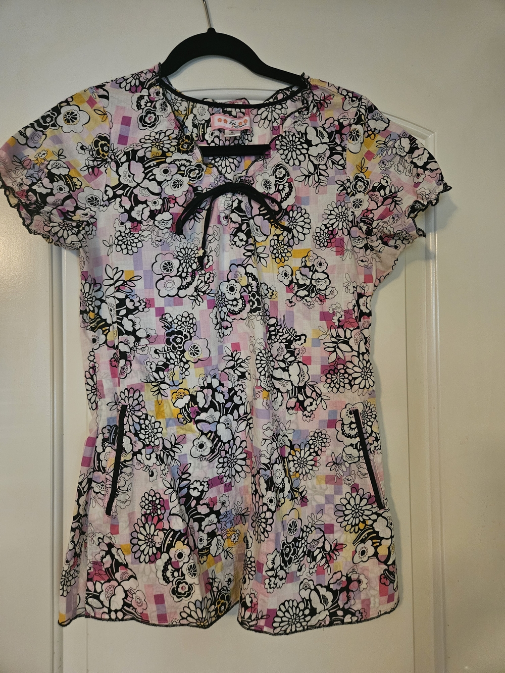 koi Floral Print Scrub Top in White, Pink, Black, Yellow